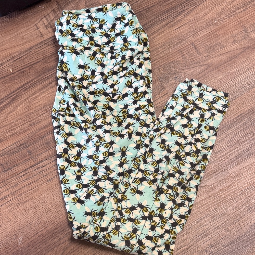 LuLaRoe Bee Patterned Leggings - Black and Yellow on Light Blue